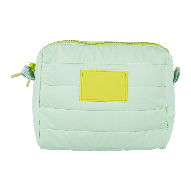 Various padded hand-held toiletries bags