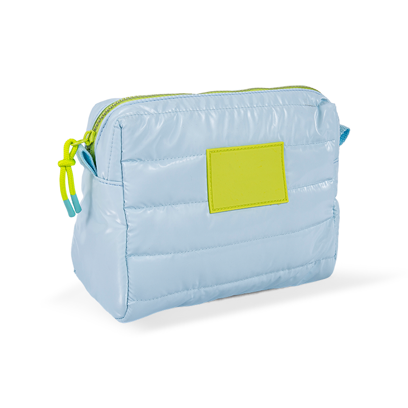 Various padded hand-held toiletries bags